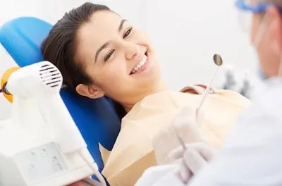 Dr. Thayer providing dental care for a patient at Brite Dental Partners