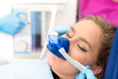 woman sleeping soundly during her dental procedure thanks to sedation dentistry