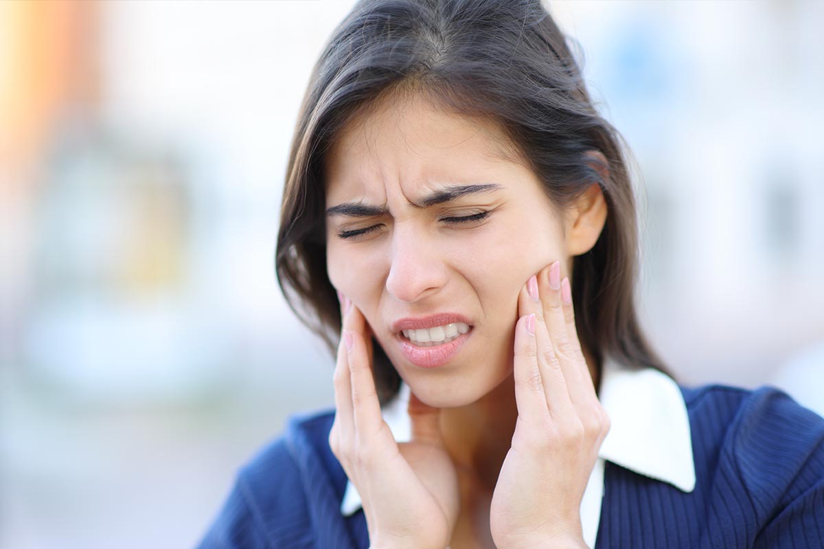 woman in need of TMJ treatment